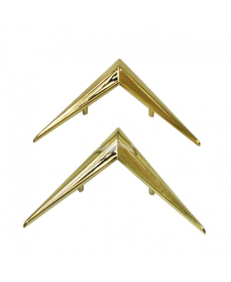 Golden chevron in metal